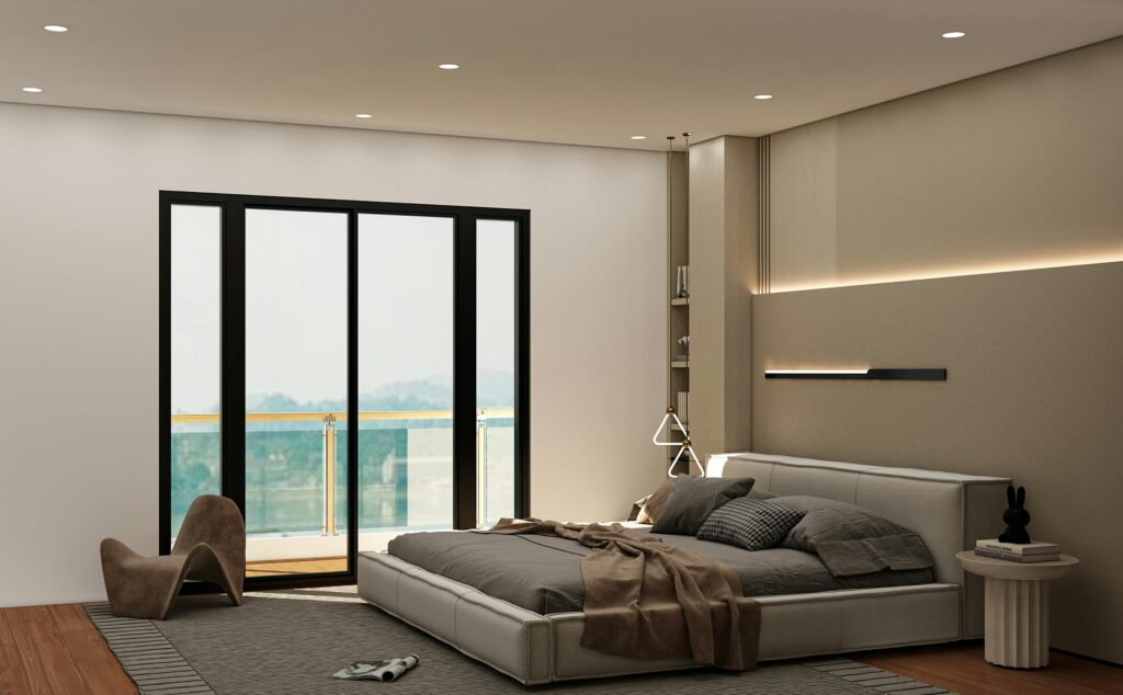 Sleek and stylish modern bedroom with minimalist decor and natural lighting.
