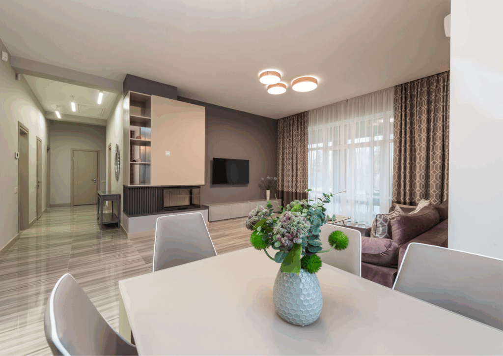 living interiors, sofa set, dining area, tv unit, living area, hall, book unit in living room, Vibe Vista-residential interior designers in Hyderabad